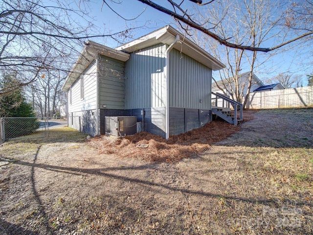 view of property exterior with central air condition unit