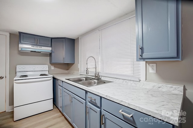 kitchen featuring sink, light hardwood / wood-style flooring, and white electric range