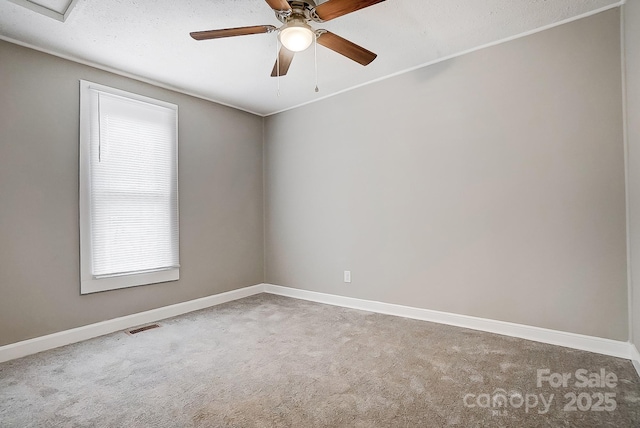 carpeted empty room with ceiling fan