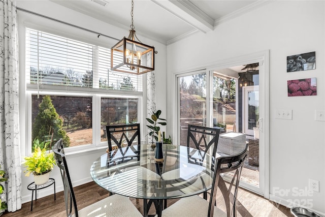 dining space featuring crown molding, hardwood / wood-style floors, beamed ceiling, and a notable chandelier