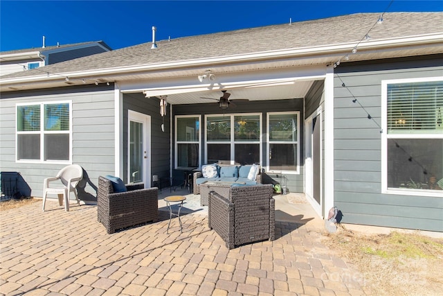 view of patio / terrace featuring an outdoor living space and ceiling fan