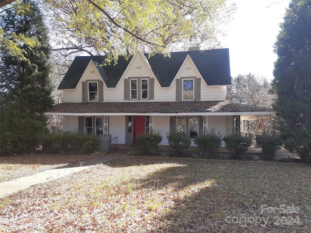 view of front of property featuring covered porch