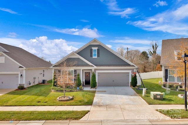 craftsman inspired home with central air condition unit, a front yard, and a garage