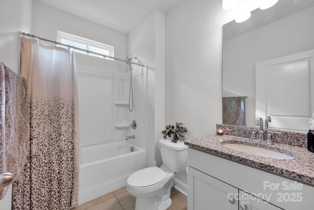 full bathroom featuring tile patterned flooring, vanity, toilet, and shower / bathtub combination with curtain