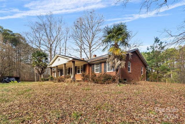 single story home featuring a porch