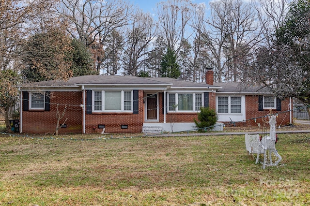 ranch-style home with a front yard