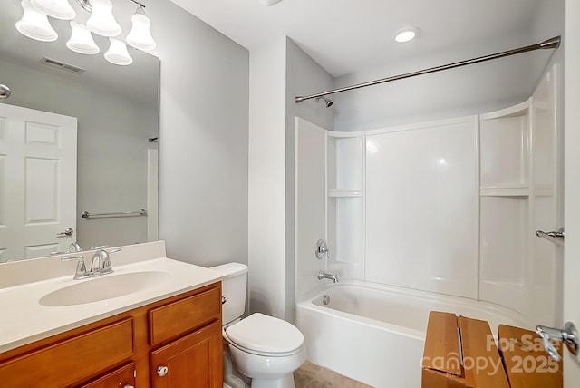 full bathroom featuring vanity, toilet, and  shower combination