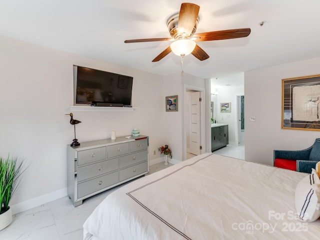 bedroom featuring connected bathroom and ceiling fan