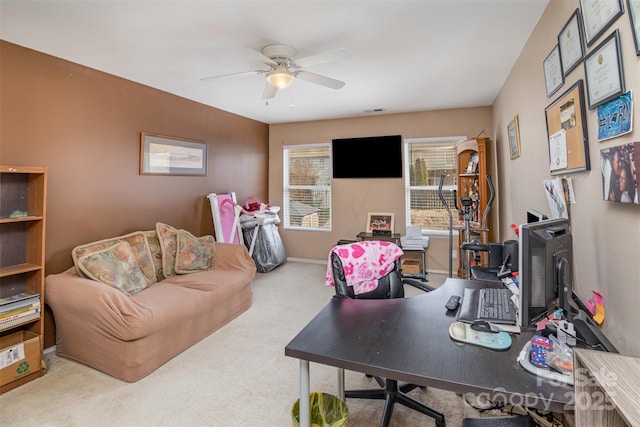 office area featuring carpet floors and ceiling fan