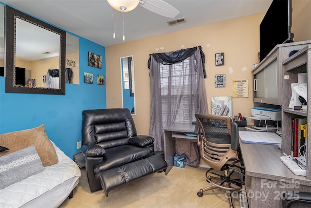 office area featuring carpet and ceiling fan