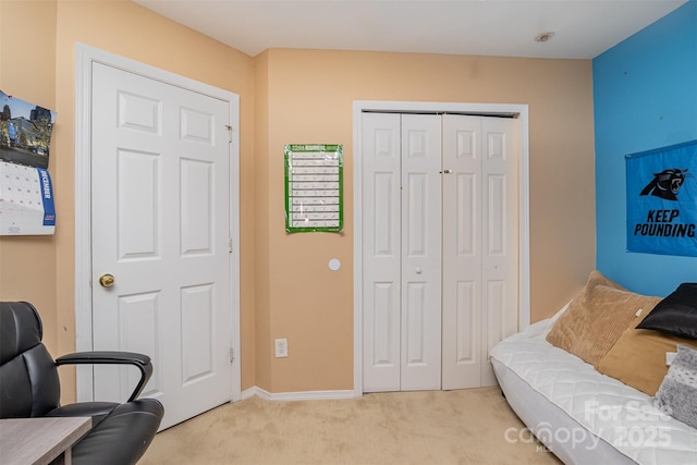 living area with light carpet