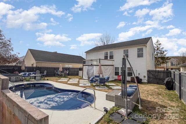 view of swimming pool with a patio area