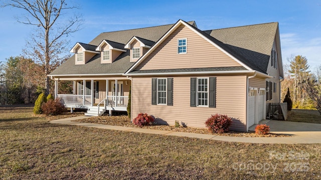 cape cod house with a front yard, a garage, and a porch