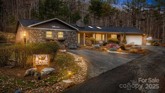 ranch-style home with a garage