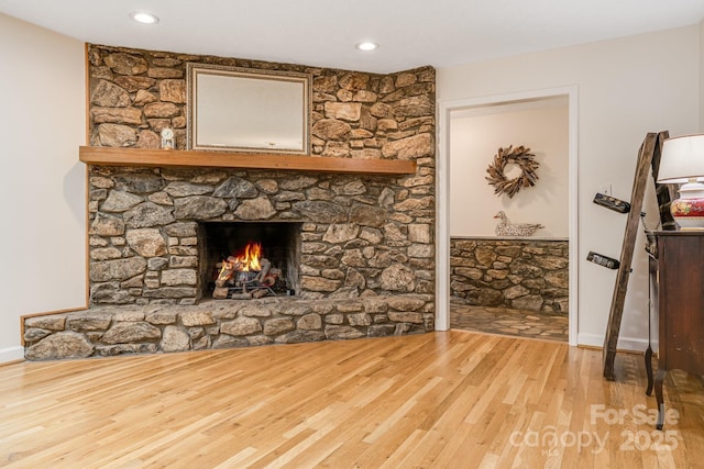 53 Jump Cove Rd, Weaverville, NC 28787 - unfurnished living room with wood finished floors, a fireplace, and recessed lighting