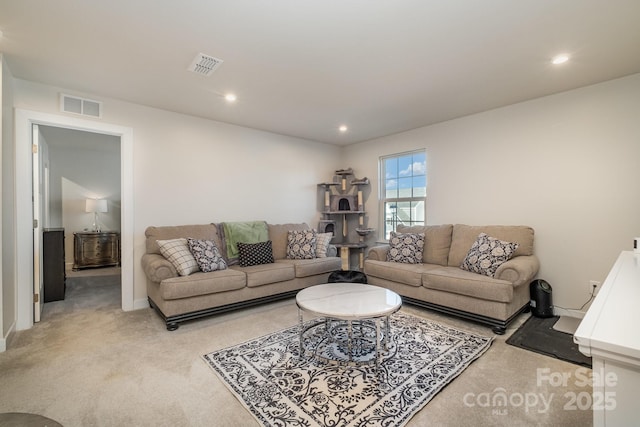 living room with light colored carpet