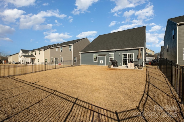 back of property with a patio area