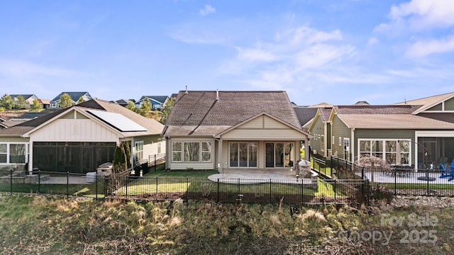 back of property featuring a fenced backyard and a patio