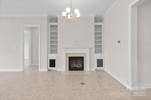 unfurnished living room featuring built in shelves, a fireplace, and baseboards