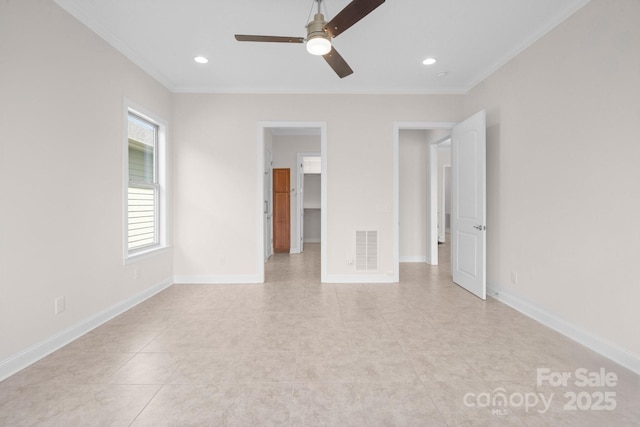 unfurnished bedroom featuring recessed lighting, visible vents, crown molding, and baseboards