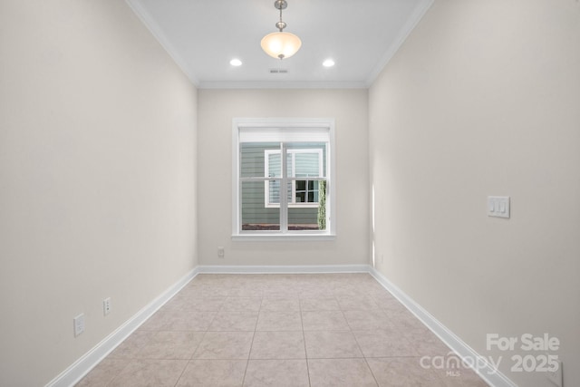 empty room featuring ornamental molding, recessed lighting, and baseboards