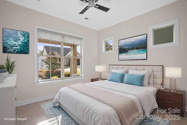 bedroom with visible vents, crown molding, baseboards, and light tile patterned floors