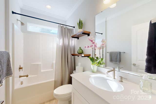 full bathroom featuring crown molding, shower / bath combo with shower curtain, vanity, and toilet