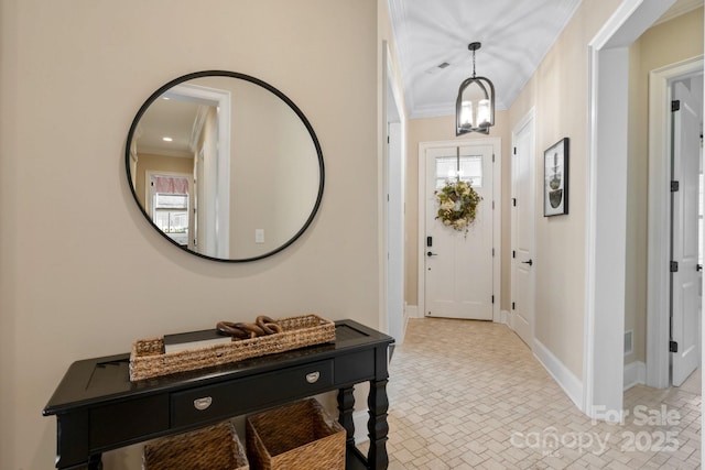 entrance foyer with crown molding