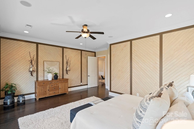 bedroom featuring wooden walls, ceiling fan, ornamental molding, and dark hardwood / wood-style floors