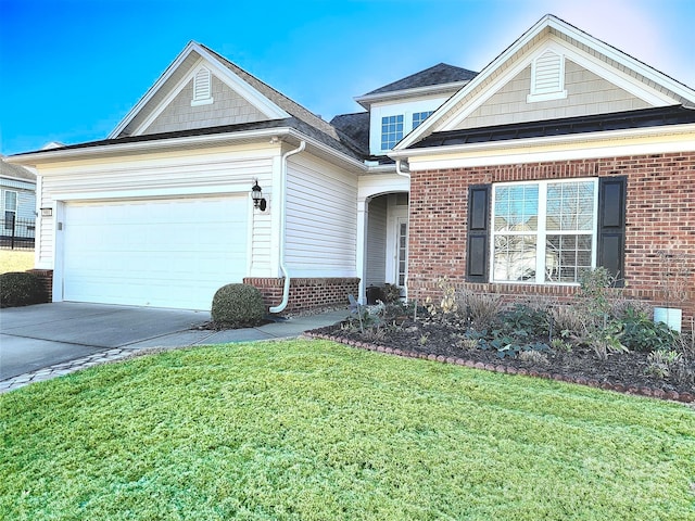 view of front of property featuring a garage, concrete driveway, brick siding, and a front lawn