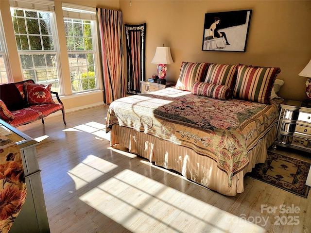 bedroom featuring light hardwood / wood-style flooring