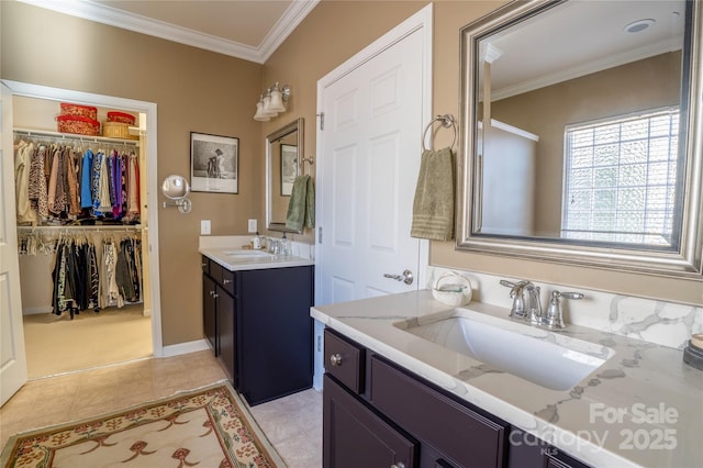 bathroom featuring tile patterned floors, vanity, and crown molding