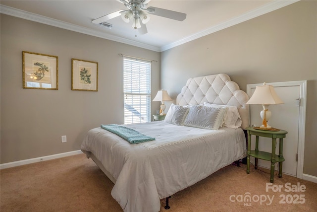 carpeted bedroom featuring ceiling fan and ornamental molding