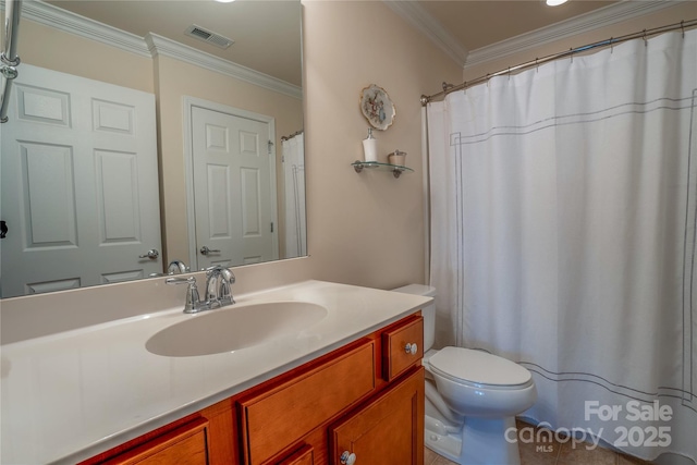 bathroom featuring toilet, vanity, and crown molding