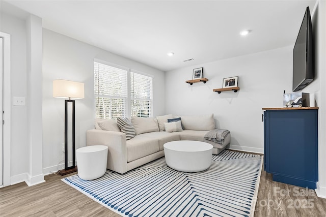 living room featuring hardwood / wood-style floors