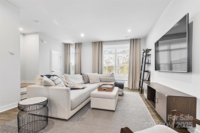 living room with light hardwood / wood-style floors