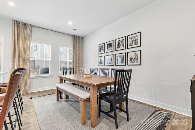 dining room featuring wood-type flooring