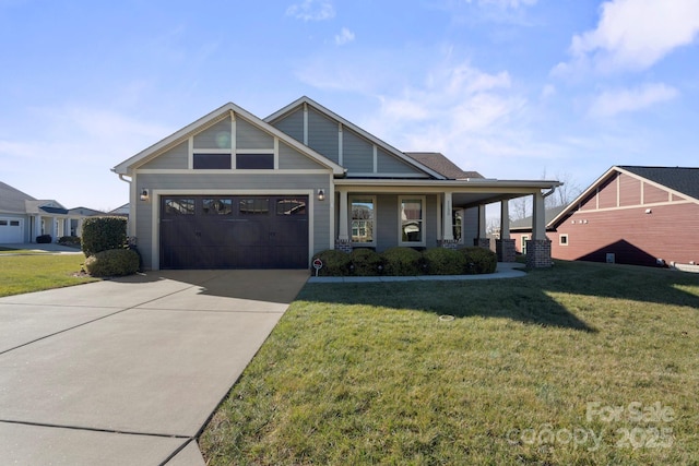 view of front of home featuring a garage, covered porch, and a front lawn