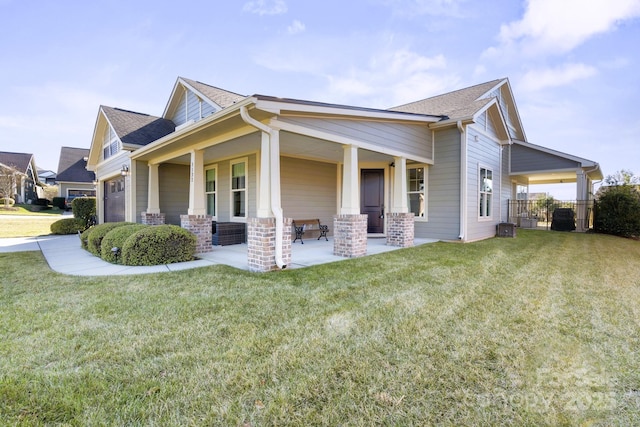 view of side of property with a yard and a garage