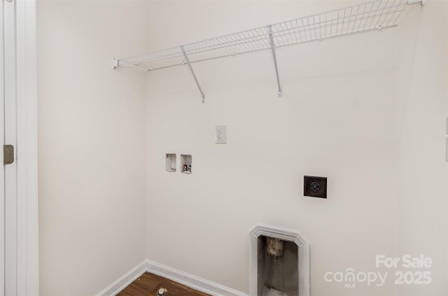 washroom with baseboards, dark wood finished floors, electric dryer hookup, laundry area, and washer hookup