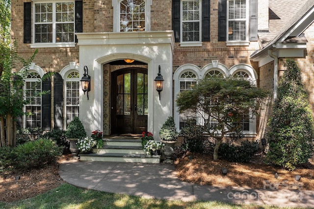 doorway to property with french doors