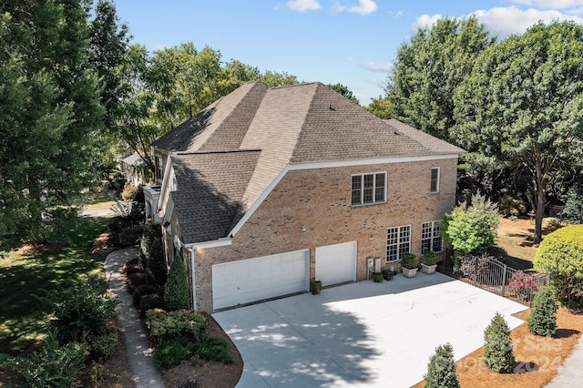 view of property exterior featuring a garage