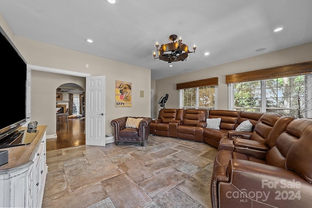 living room featuring a notable chandelier