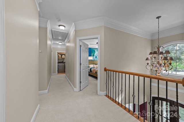 corridor featuring light colored carpet, a chandelier, and ornamental molding