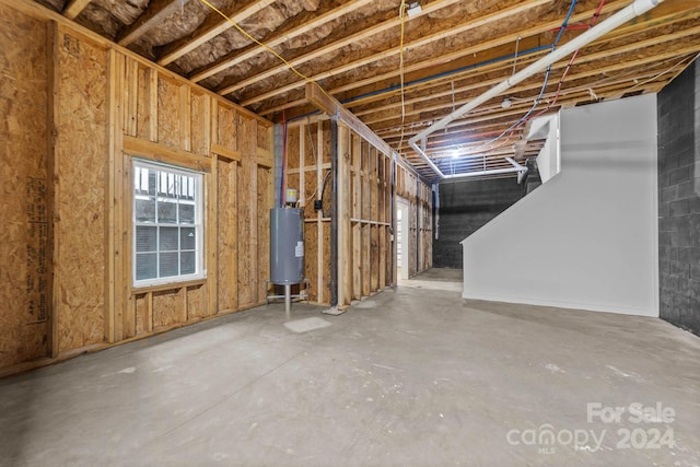 basement featuring water heater