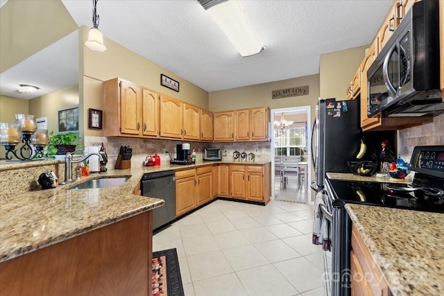 kitchen featuring stainless steel electric range, hanging light fixtures, light stone countertops, black dishwasher, and a notable chandelier