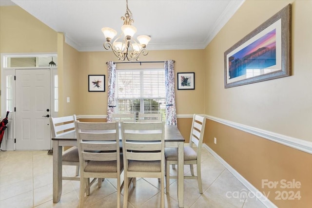 tiled dining space featuring crown molding and a notable chandelier