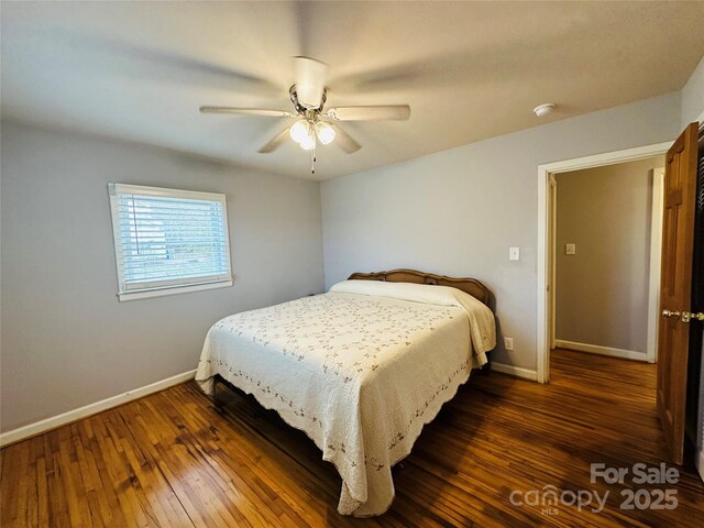 bedroom with a ceiling fan, baseboards, and hardwood / wood-style floors