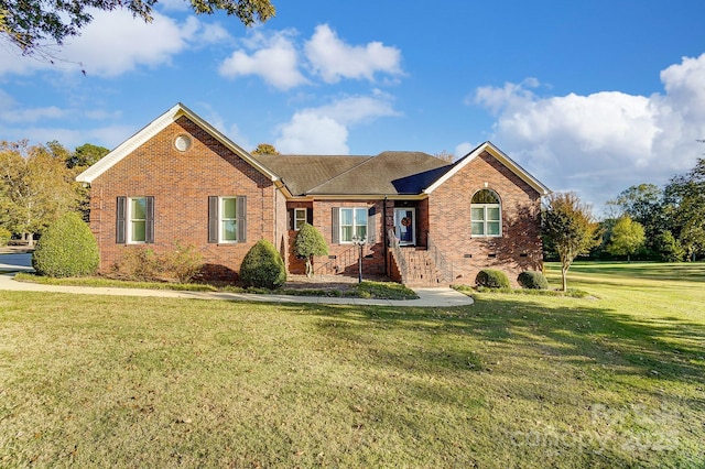 view of front of property with a front lawn