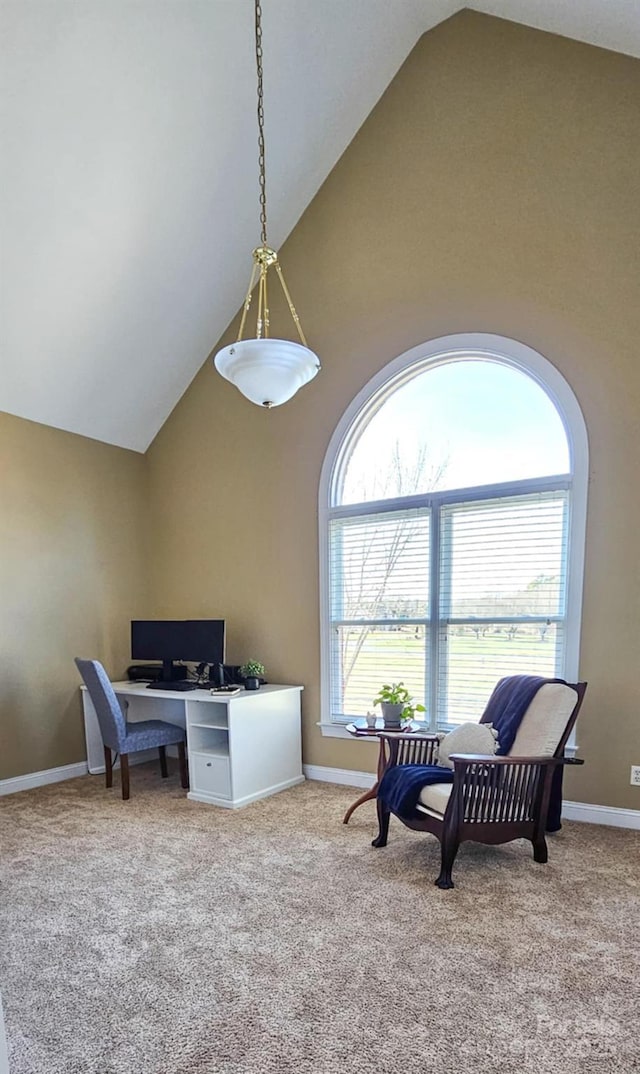 home office featuring carpet floors and high vaulted ceiling